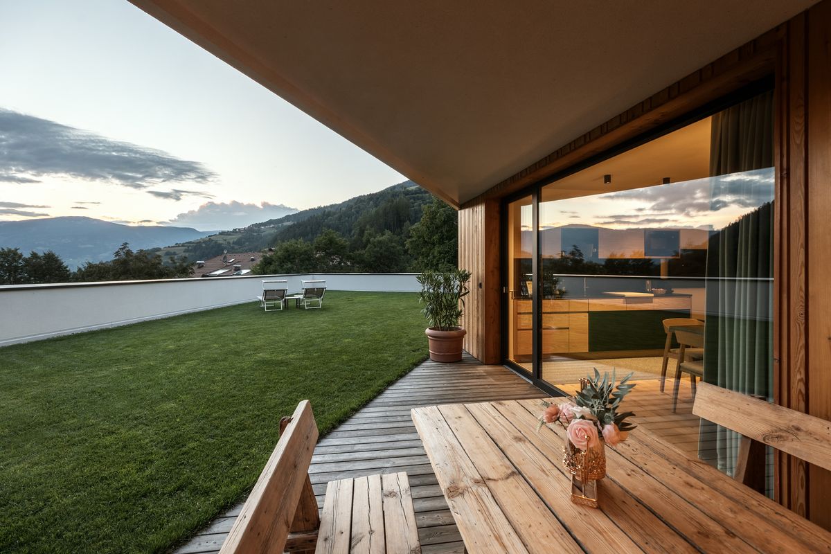Terrace and lawn in the evening