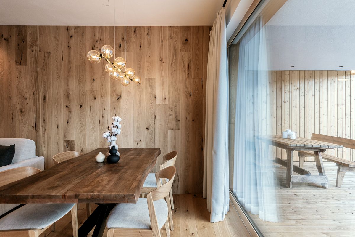Dining area with oak wall