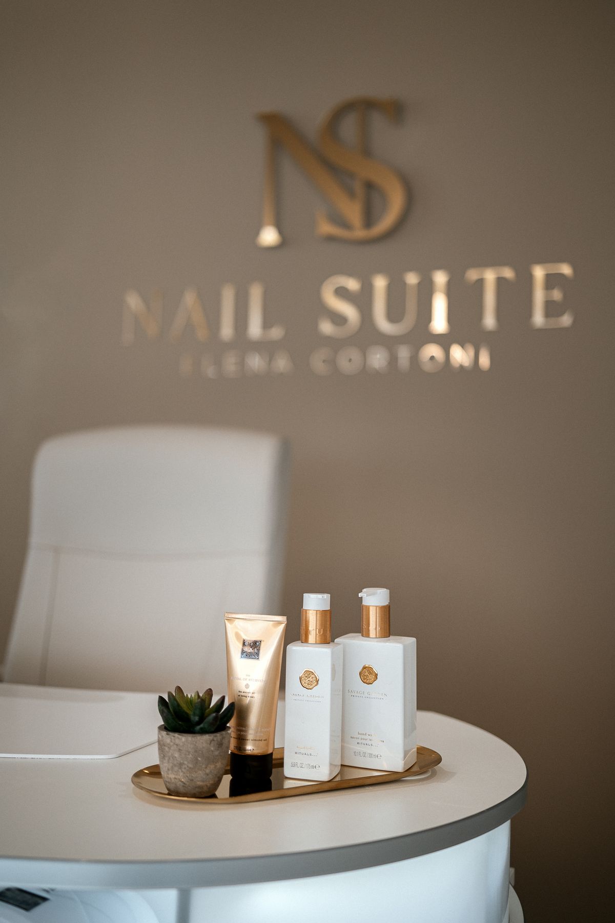 Care products in front of the logo