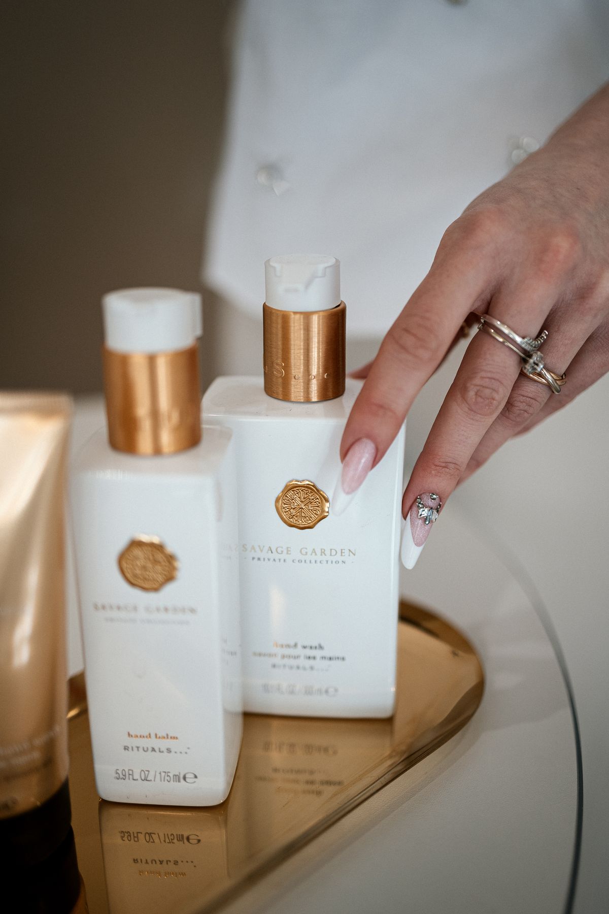 Hand reaching for care products