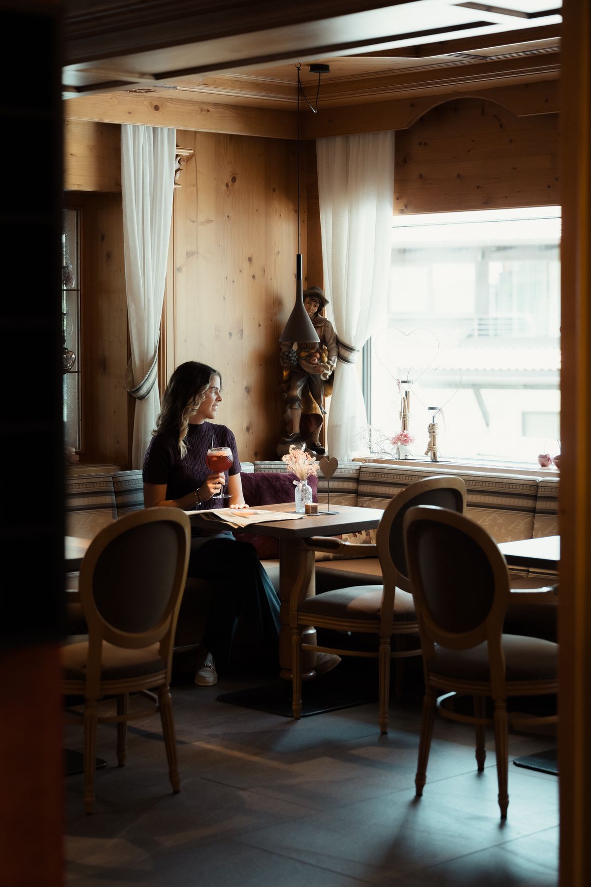 Guest by the window in the parlour