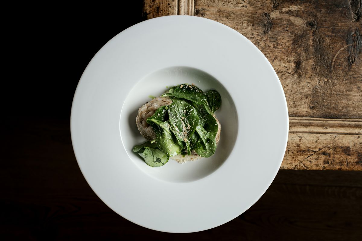 Green dish in a deep plate