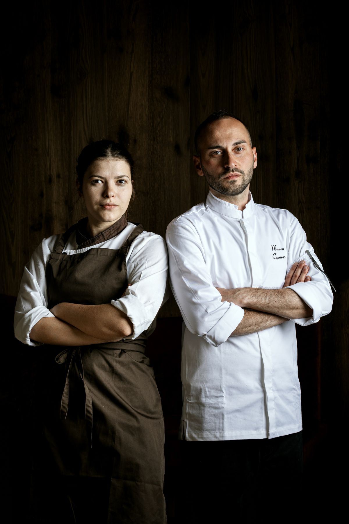 Two chefs with arms crossed