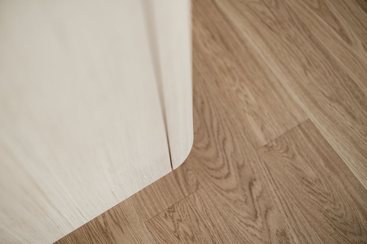 Wooden floor and cabinet front in detail