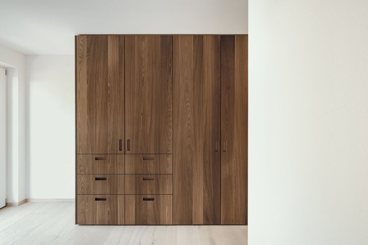 Built-in walnut wardrobe