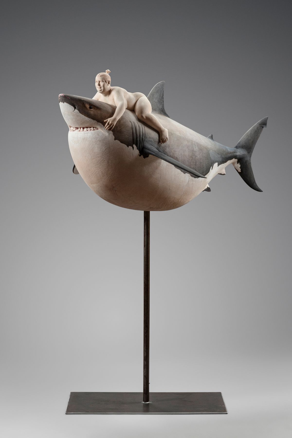 Woman riding a shark