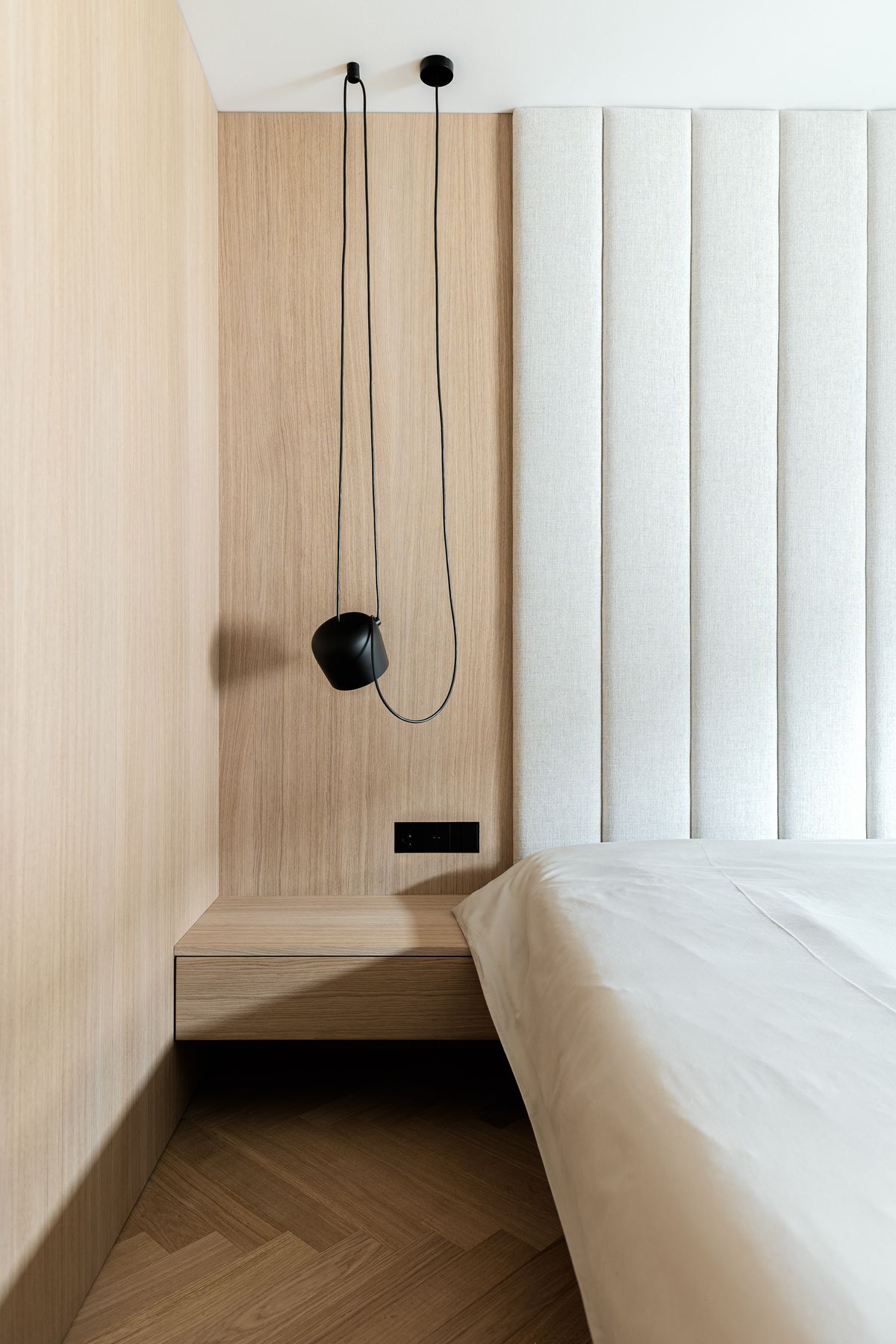 Bed with upholstered headboard