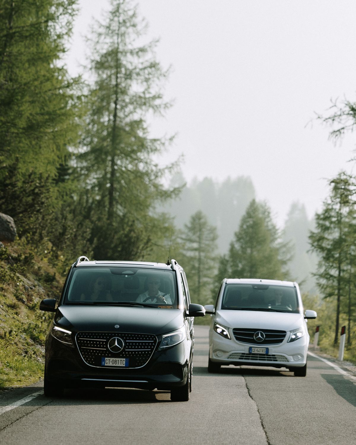 Two vans on the pass road