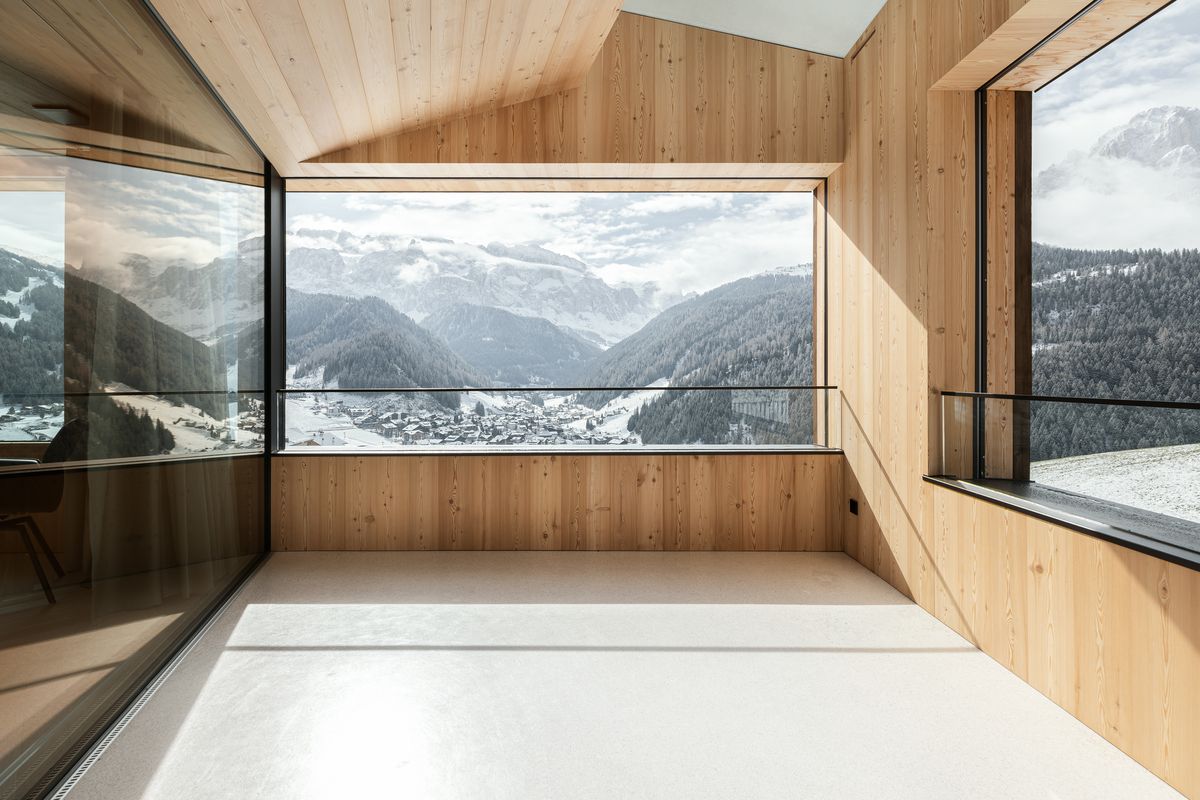 Wood-panelled room with panoramic window