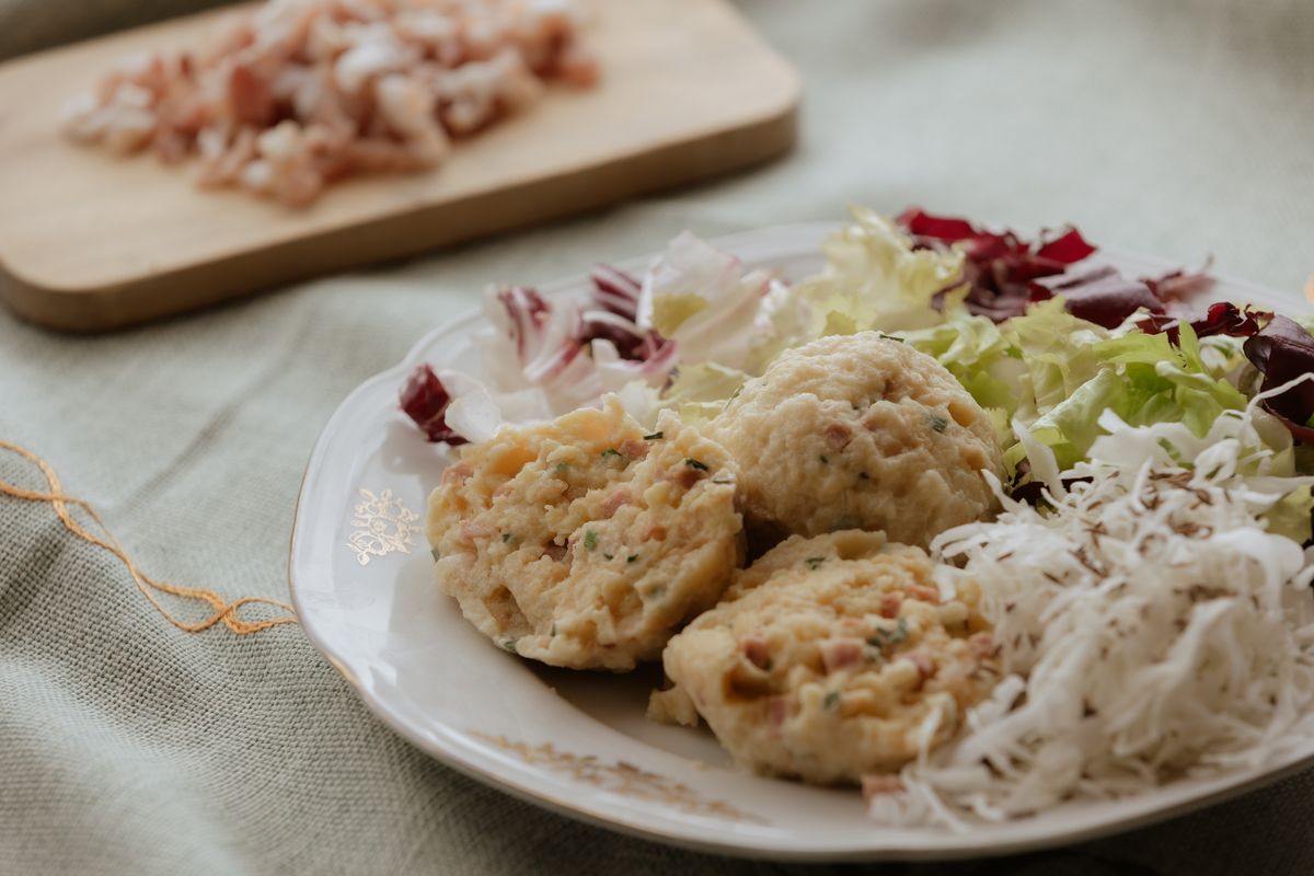 Bacon dumplings with cabbage salad