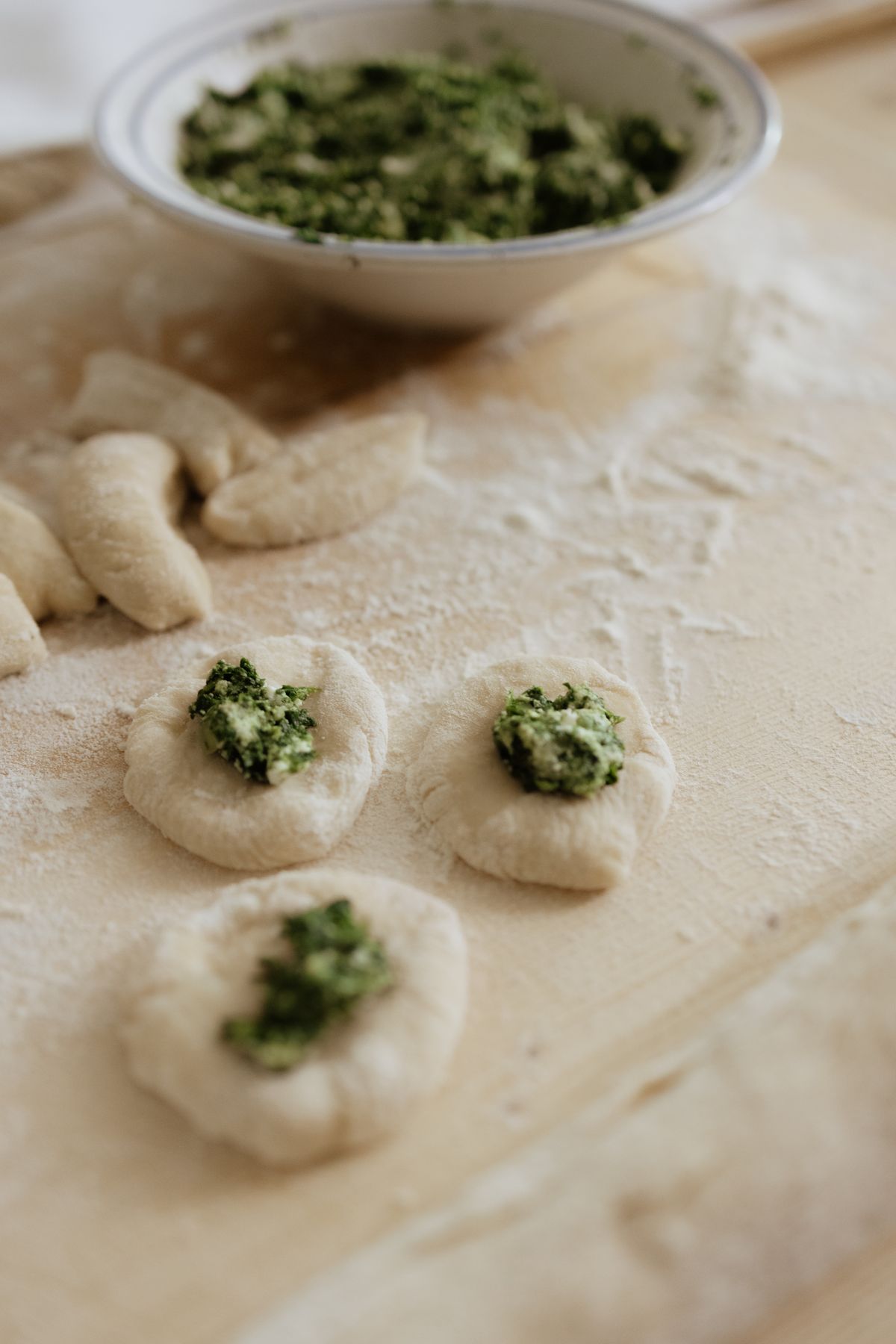 Spinach dumplings being prepared