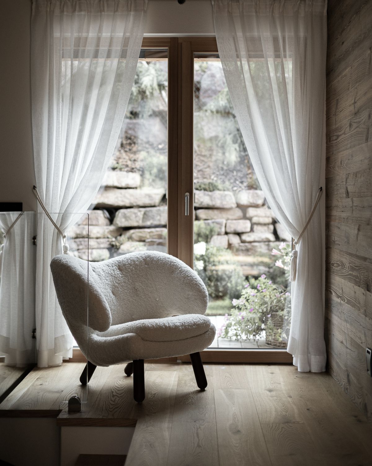Shearling armchair by the window
