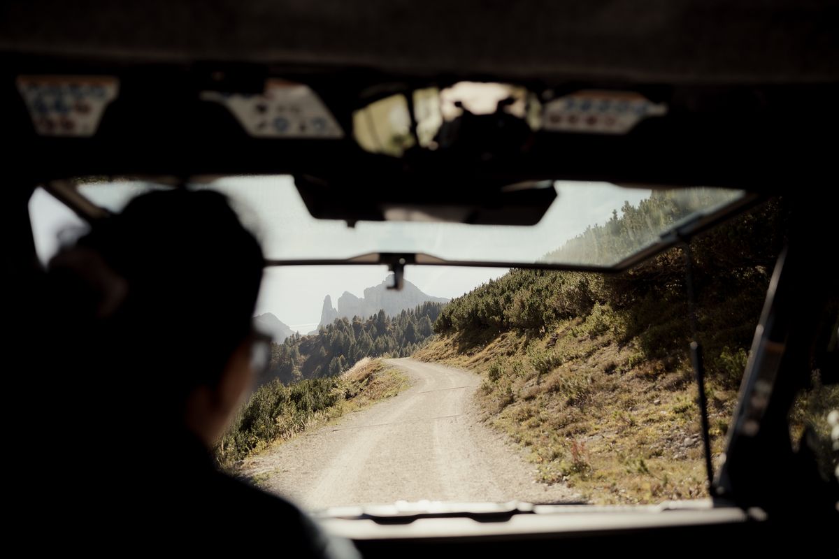 Off-road transfer along an alpine track up to the hut