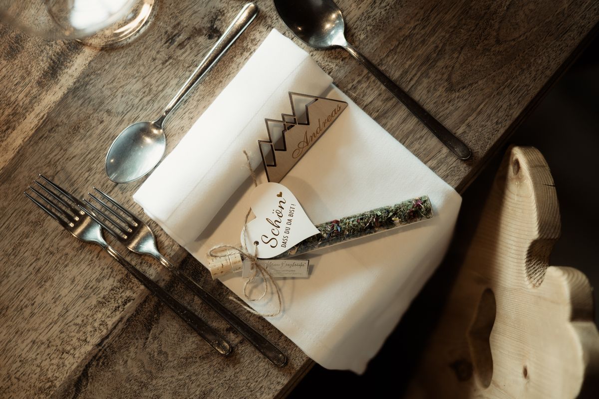 Wooden table set with a place card
