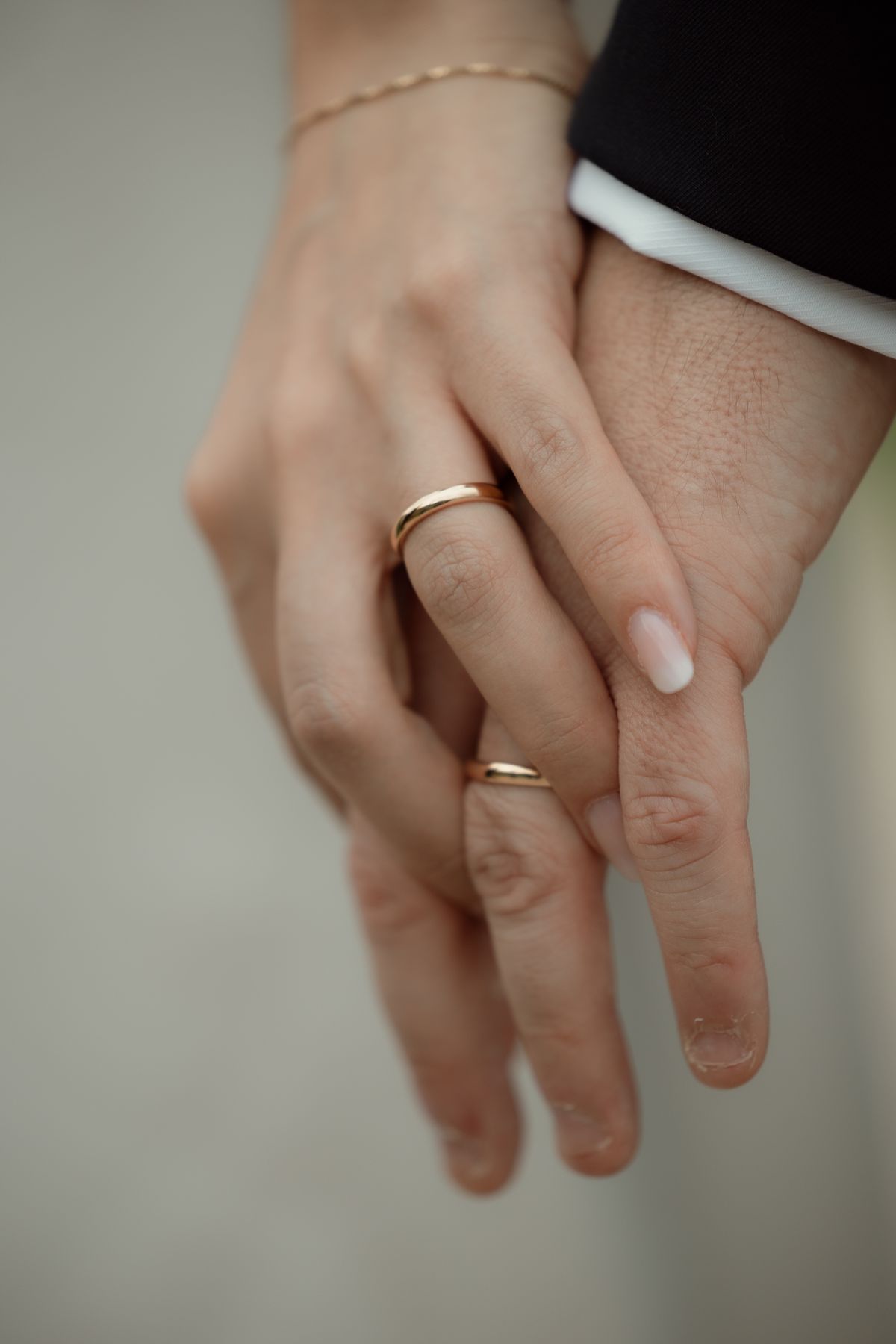 Hands with wedding rings